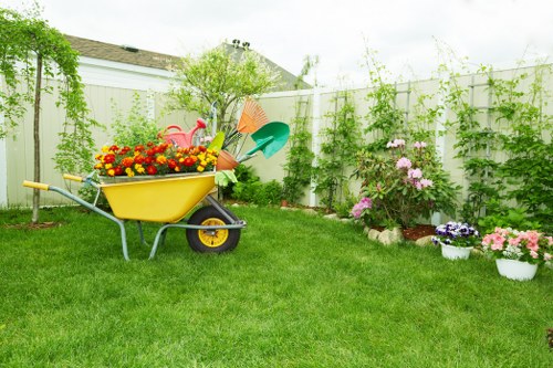 Worker handling materials safely during landscaping operations